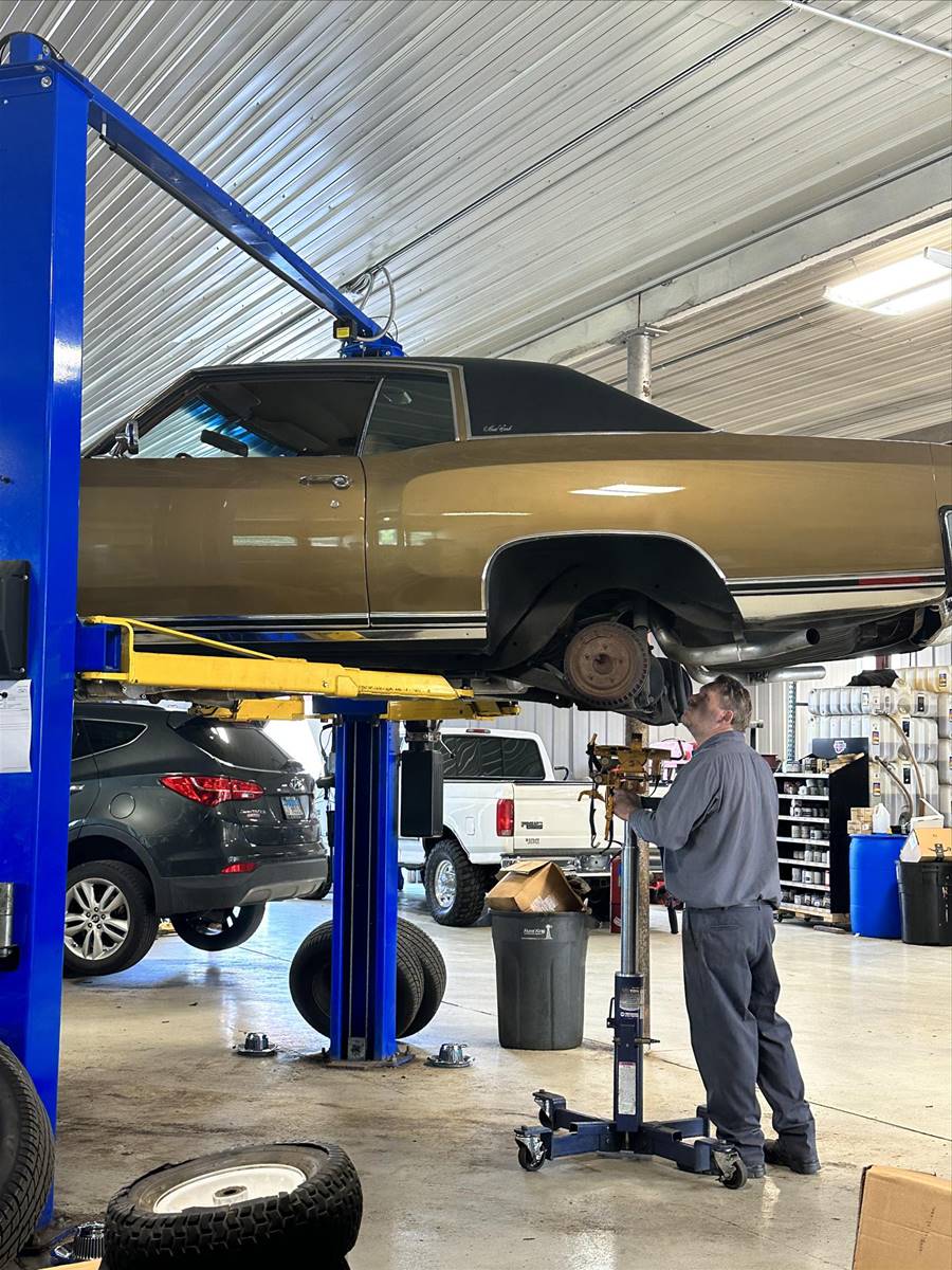 Vehicle on lift inside Corner FS